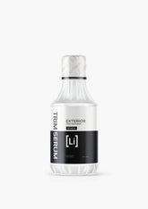 Bottle of Trim Serum Restorer against a pristine white backdrop